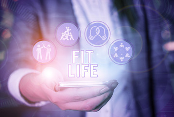 Conceptual hand writing showing Fit Life. Concept meaning maintaining a healthy weight with diet...