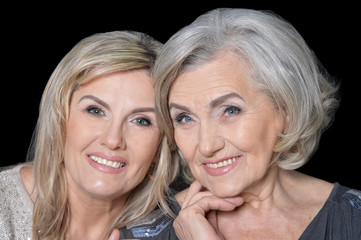 Close up portrait of beautiful senior women isolated