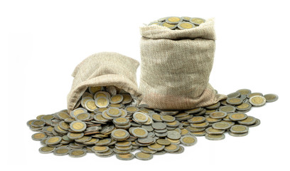 Stacking coin in sack on white background