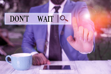 Conceptual hand writing showing Don T Wait. Concept meaning Take action now and do something for a...