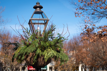 Christmas garland on vintage metal lamp post