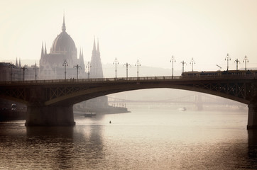 Naklejka premium Hazy Budapest, View with the Parliament and River Danube