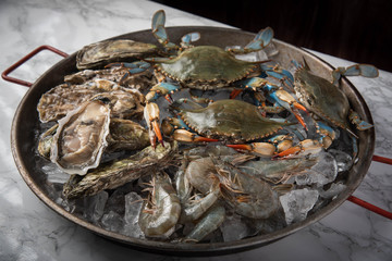 crustacean in pan filled with ice