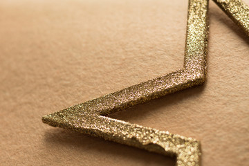 Decorative elements in golden tones, close up. Preparation and execution of handmade work....