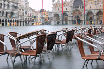 chairs submerged on Venice Square during the flood