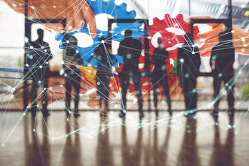 Business team connect pieces of gears. Teamwork, partnership and integration concept. double...