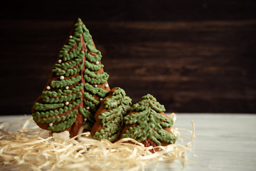 Gingerbread cookies are made by hand for Christmas in the form of tree