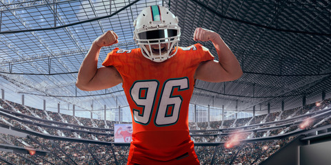 American football players in professional stadium.