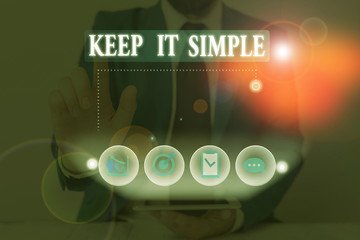 Conceptual hand writing showing Keep It Simple. Concept meaning Remain in the simple place or...