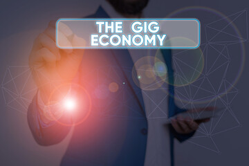 Text sign showing The Gig Economy. Business photo text Market of Shortterm contracts freelance work...