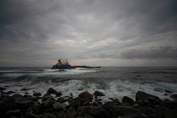 ship sinking after storm in the sea