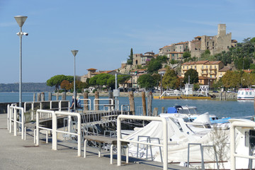 Passignano on Trasimeno Lake panorama from the tourist port of the village built on a rocky spur...
