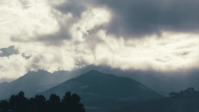 4K Timelapse Sequence of Quitsato, Ecuador - The Cayambe Mountain during a cloudy day as seen from Quitsato Sundial (medium shot)