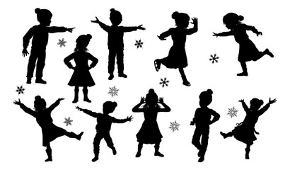 Fototapeta premium A set of children in silhouette playing having fun in Christmas or winter cold weather clothing