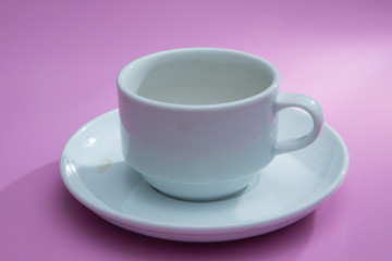 coffee cup over pink background . sugar .Glass cup isolated on a pink background with clipping path. Front view .