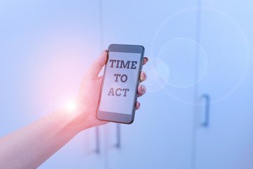 Obraz premium Writing note showing Time To Act. Business concept for Do it now Response Immediately Something need to be done woman using smartphone and technological devices inside the home