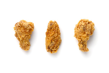 Fried wings on a white background. Deep-fried chicken wings close-up.