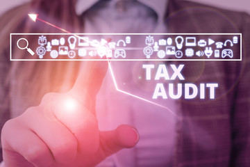 Handwriting text writing Tax Audit. Conceptual photo examination or verification of a business or...