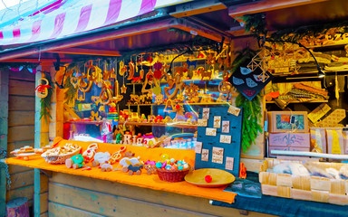 Christmas Tree Glass Decorations on Christmas Market in Winter Riga, Latvia. Advent Fair Decoration, and Stalls with Crafts Items in Bazaar.. Street Xmas and holiday fair in European city or town.
