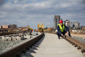 Railroad worker working on the train truck