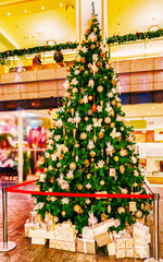 Christmas Tree Glass Decorations on Christmas Market in Winter Riga, Latvia. Advent Fair Decoration, and Stalls with Crafts Items in Bazaar.. Street Xmas and holiday fair in European city or town.