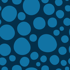 Big blue polka dots on dark blule background vector pattern.