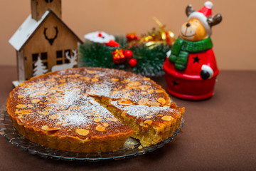 Swedish Almond pie tart with christmas themed background