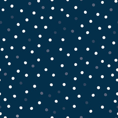 Small polka dots on dark blule background vector pattern.