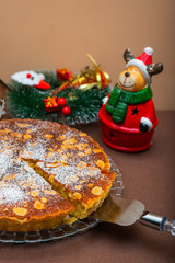 Swedish Almond pie tart with christmas themed background