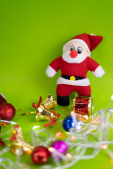 Santa Cluas Christmas composition on the green background  Beautiful decoration and elegant accessories. Merry Christmas and Happy Holidays