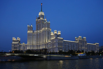 Fototapeta na wymiar Moscow. High-rise building on Kotelnicheskaya embankment. Night view from the Moscow river