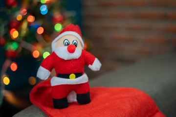 Santa Cluas Christmas composition on the brick wall background  Beautiful decoration and elegant accessories. Merry Christmas and Happy Holidays