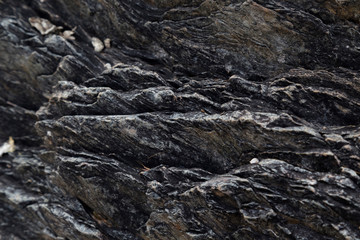 granite rock, quartz and nickel streaks texture