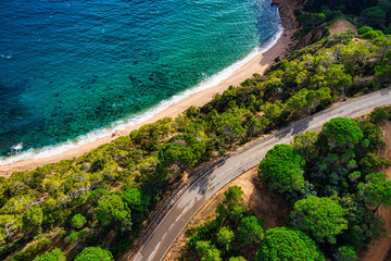 Sea Aerial view. Top view, nature background. Azure sea beach with rocky mountains and clear water at sunny day. Flying drone. Tropical trees. - 306230901