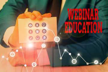 Conceptual hand writing showing Webinar Education. Concept meaning online meeting or presentation held via the Internet