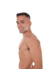 Fototapeta premium Shirtless man standing waist up in profile and smiling