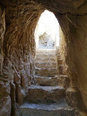 Ancient Tholing Monastery, Tibet. Ruins of ancient capital of Guge kingdom. Cave town inside a pyramid-shaped rock and a royal palace on the top.