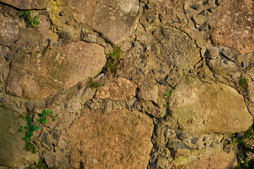 Old stone wall with moss