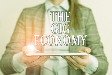 Handwriting text writing The Gig Economy. Conceptual photo Market of Shortterm contracts freelance...
