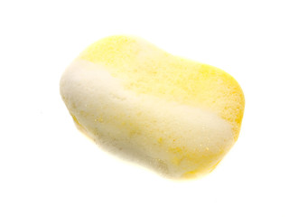 Yellow bath sponge in foam isolated on a white background. Large washcloth in soapy foam. Washcloth with body lather. 