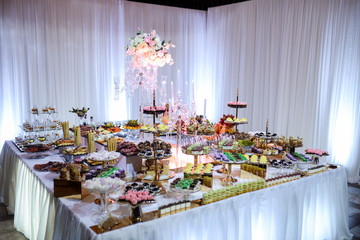 Sweets and cakes. Designer sweets on candy bar