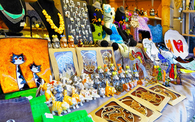 Christmas Ceramics Decorations on Christmas Market at Riga, Latvia. Advent Fair, and Stalls with Crafts Items in Bazaar. Night street Xmas and holiday fair in European city or town, December.
