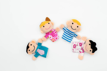 Happy family:  kids son, daughter, mother, father.  Family concept. finger puppet dolls.