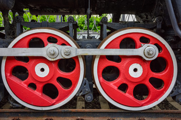 red metal wheels, two wheels of steam locomotive