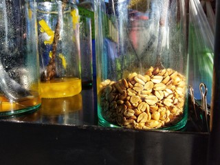 Beans in a glass jar and ice cream topping