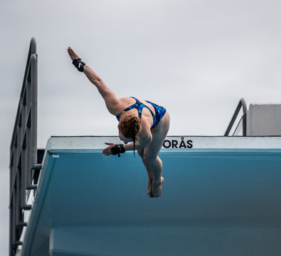 Platform Diver Performing A Dive From 10M Platform