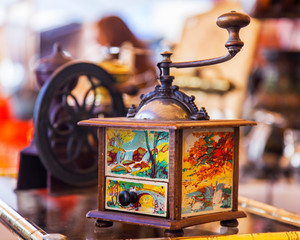 Nice, France, October 14, 2019. Vintage coffee grinder on traditional flea market counter
