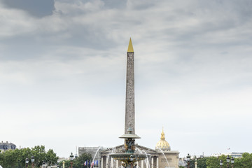Fototapeta na wymiar The Obelisk of Luxor at the centre of the Place de la Concorde—Paris’ largest square, located in 8th arrondissement. High Resolution Image.