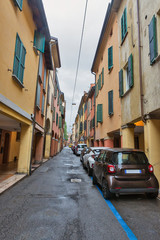 Narrow street in Bologna, Italy.