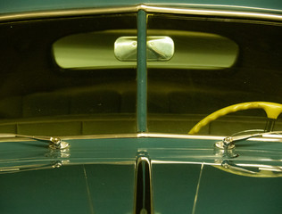 Fototapeta na wymiar Vintage car hood, wheel and mirror